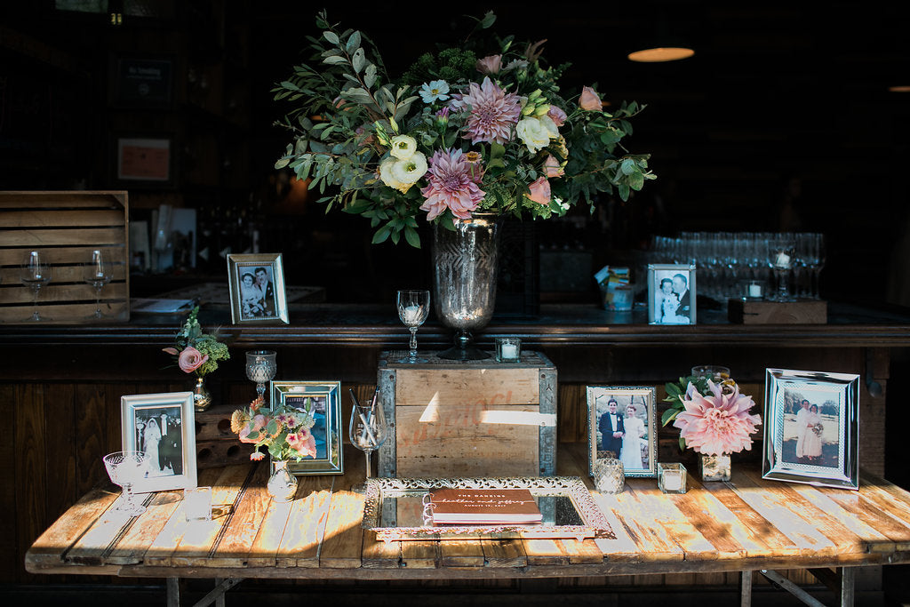 Brooklyn Winery wedding July flowers cream Lisianthus Cafe Au Last Dahlia explosion grass champagne pale pink and white sage green Molly Oliver Flowers sustainable floristry bouquets cherry caramel phlox welcome table guest book table bud vases large arrangement
