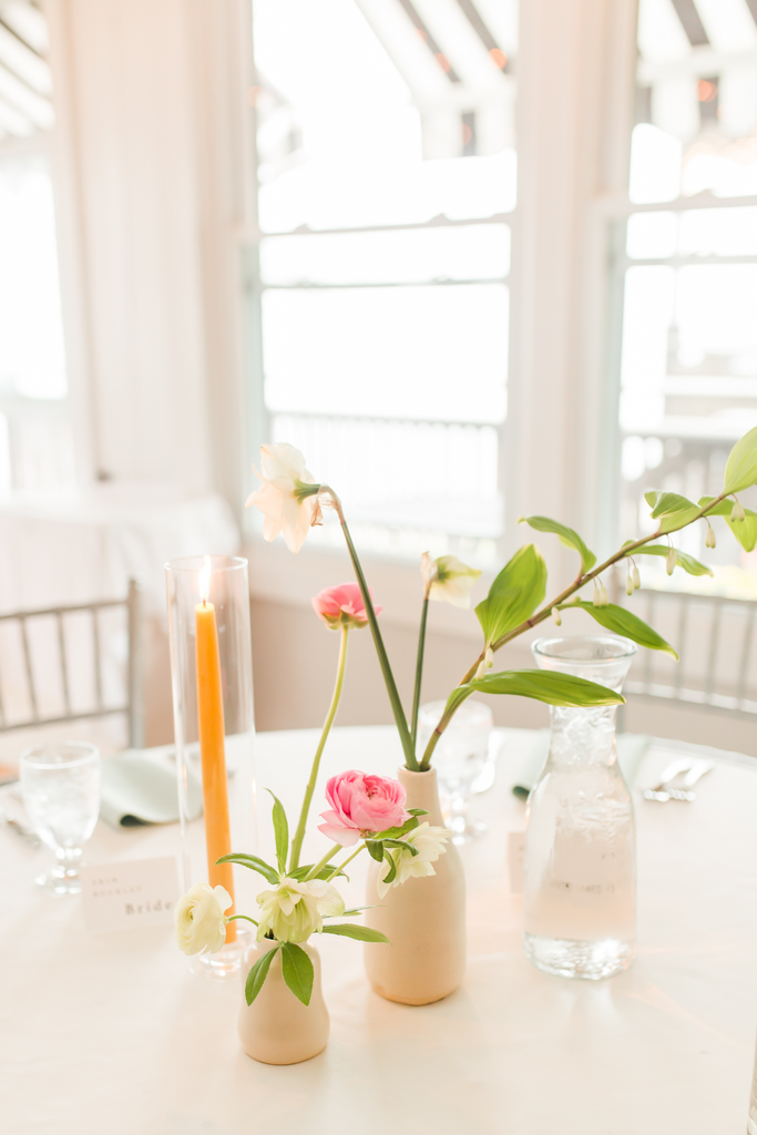 Owenego Inn Branford spring wedding ceramic bud vases ranunculus Solomon’s seal daffodil beeswax taper candle Molly Oliver Flowers Connecticut shoreline wedding florist
