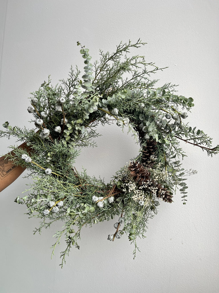 Molly Oliver Flowers Winter Wreath Holiday decorative evergreen snowy baby's breath balsam eastern white cedar silver bells eucalyptus NYC Brooklyn Delivery