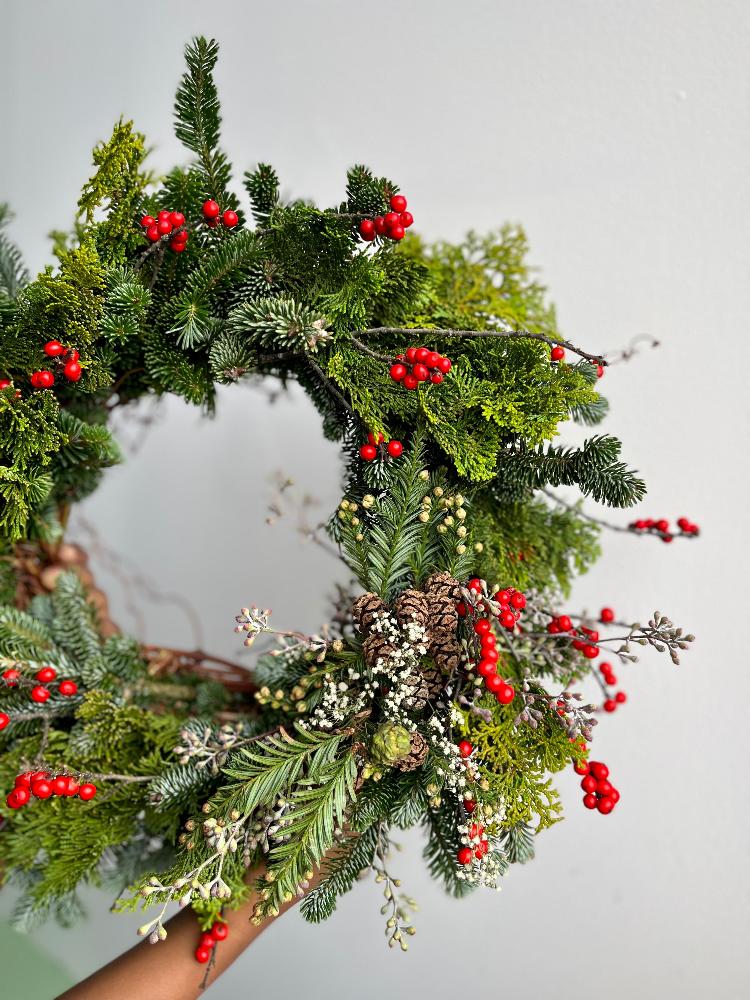 Molly Oliver Flowers Winter wreath Red Ilex Berries and Evergreen