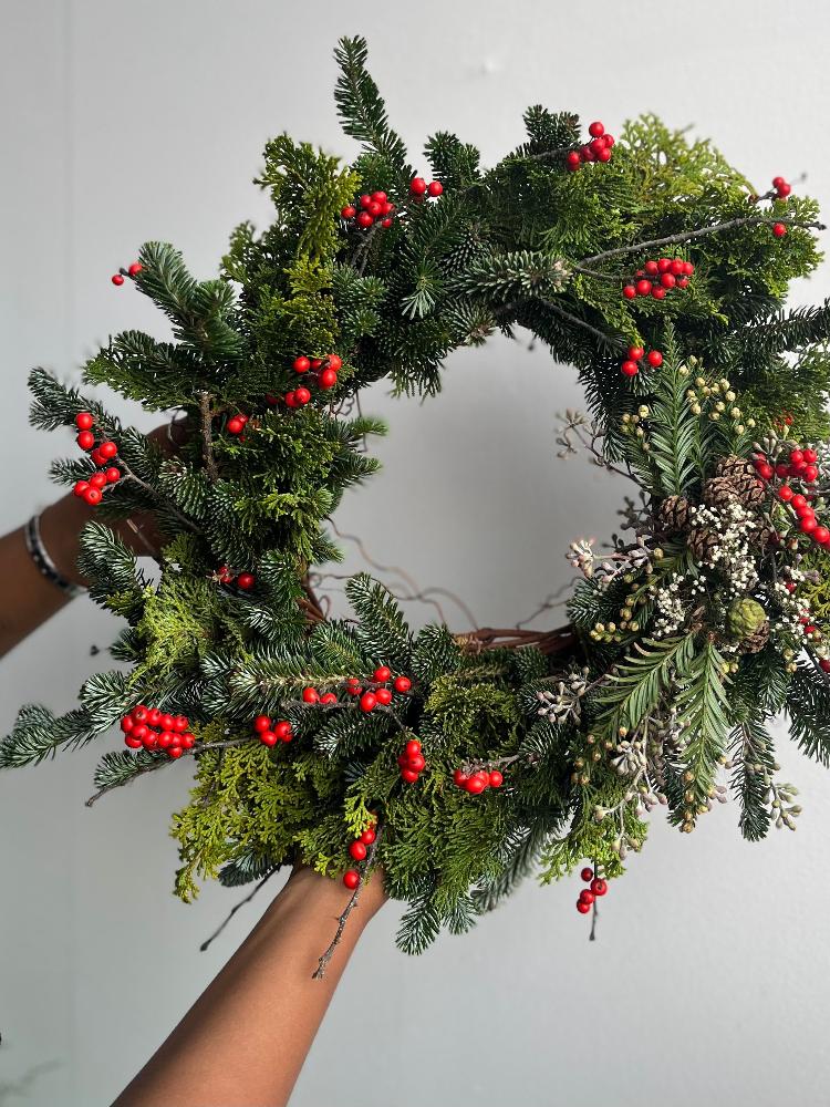 Molly Oliver Flowers Winter wreath Holiday red and green