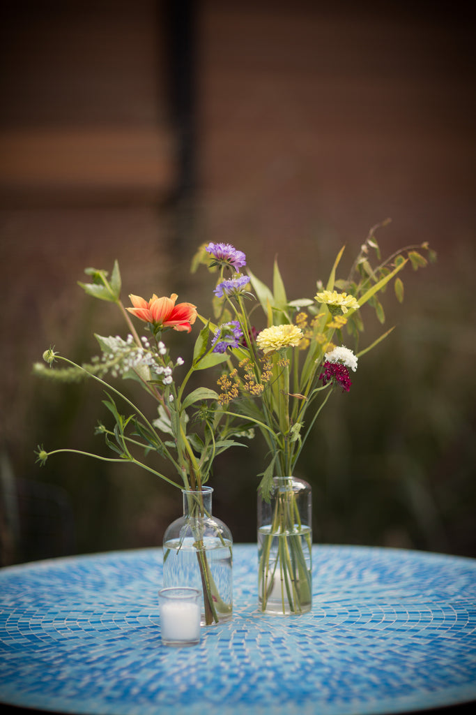 Gowanus Brooklyn NYC 501 Union Starling on Bond Molly Oliver Flowers sustainable wedding florist eco friendly Weddings by Two clear glass bud vases Bronze Fennel Scabiosa Zinnia Sea Oats high top table