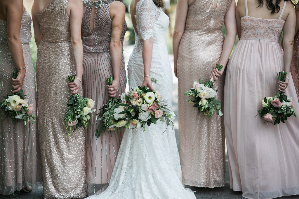 Bridesmaids at Brooklyn Winery wedding event July flowers Lisianthus explosion grass champagne pale pink and white sage green Molly Oliver Flowers sustainable floristry bouquets