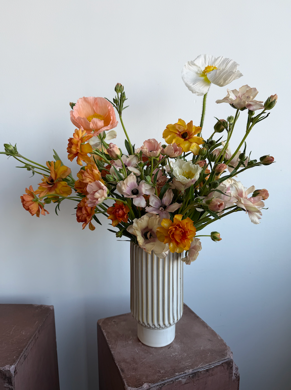 Seasonal Arrangement in Ceramic Vase