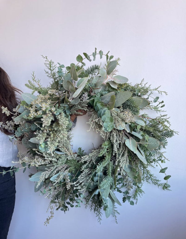 snowy blue holiday evergreen wreath